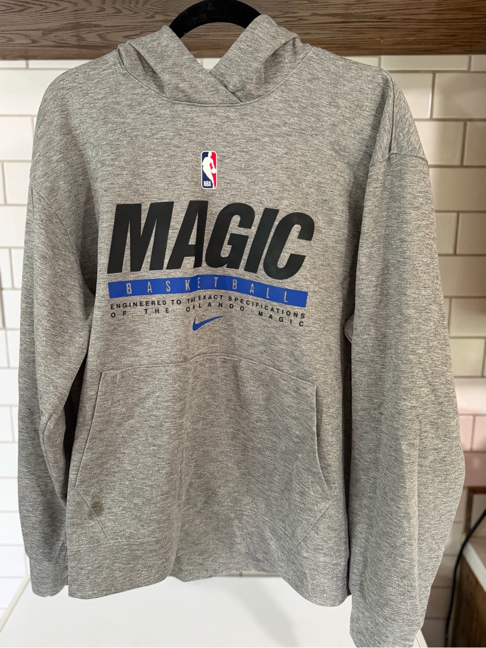 Magic Gray Pullover Hoodie with Black and Blue Team Graphics